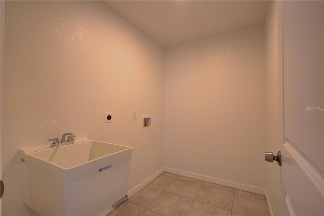 25 Sabot Ct, Placida, FL 33946 - washroom with washer hookup, light tile patterned floors, electric dryer hookup, baseboards, and laundry area