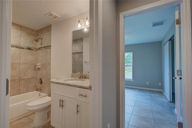 25 Sabot Ct, Placida, FL 33946 - bathroom with toilet, vanity, visible vents, and tile patterned floors