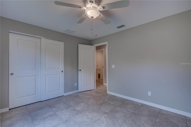 25 Sabot Ct, Placida, FL 33946 - unfurnished bedroom featuring baseboards, visible vents, ceiling fan, and a closet