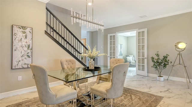 7889 Mainsail Ln, Sarasota, FL 34240 - dining space featuring marble finish flooring, french doors, baseboards, and stairs