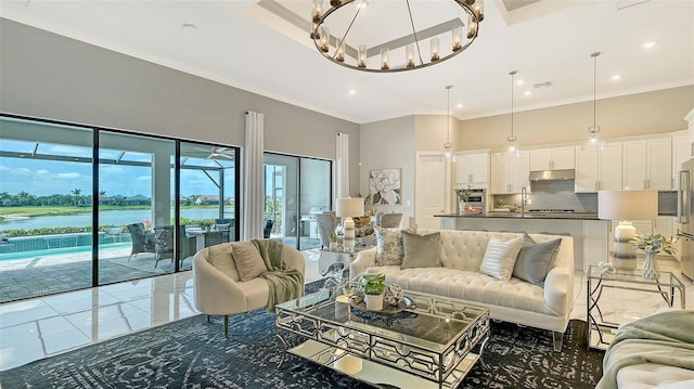 7889 Mainsail Ln, Sarasota, FL 34240 - living room featuring a chandelier, a water view, light tile patterned flooring, crown molding, and recessed lighting