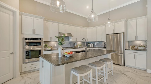 7889 Mainsail Ln, Sarasota, FL 34240 - kitchen featuring appliances with stainless steel finishes, light marble finish floors, a sink, under cabinet range hood, and crown molding