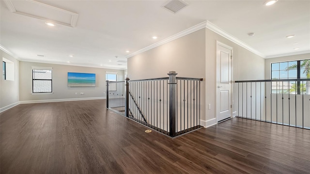 7889 Mainsail Ln, Sarasota, FL 34240 - hallway with wood finished floors, recessed lighting, ornamental molding, baseboards, and an upstairs landing