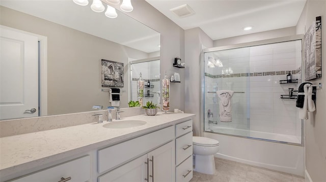 7889 Mainsail Ln, Sarasota, FL 34240 - bathroom with toilet, vanity, enclosed tub / shower combo, and tile patterned floors