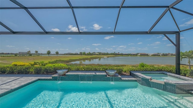 7889 Mainsail Ln, Sarasota, FL 34240 - view of swimming pool featuring a water view, a lanai, and a pool with connected hot tub