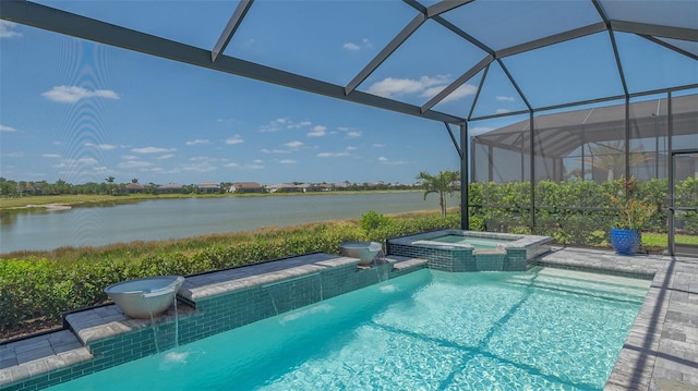 7889 Mainsail Ln, Sarasota, FL 34240 - view of swimming pool with a water view, a lanai, and a pool with connected hot tub