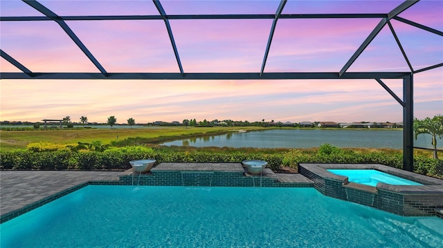 7889 Mainsail Ln, Sarasota, FL 34240 - view of pool featuring a water view, a lanai, and a pool with connected hot tub