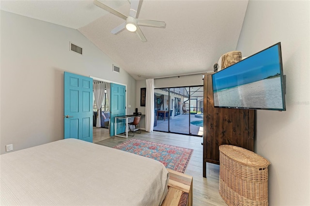 bedroom with high vaulted ceiling, access to outside, light wood finished floors, and visible vents