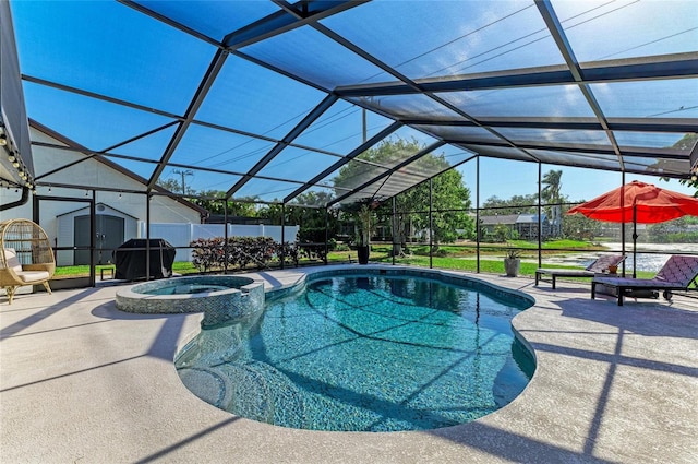 view of pool with an outdoor structure, a pool with connected hot tub, a shed, and a patio area