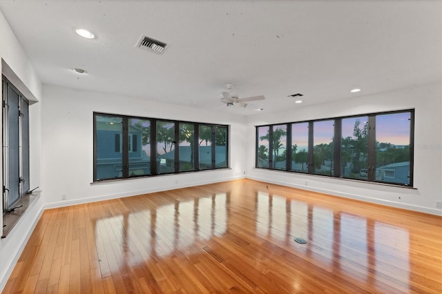 2918 Avenue Ave E, Holmes Beach, FL 34217 - spare room with light wood finished floors, ceiling fan, and recessed lighting