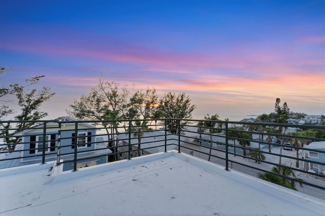 2918 Avenue Ave E, Holmes Beach, FL 34217 - patio terrace at dusk featuring a balcony
