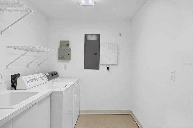 2918 Avenue Ave E, Holmes Beach, FL 34217 - laundry area with electric panel and washing machine and dryer