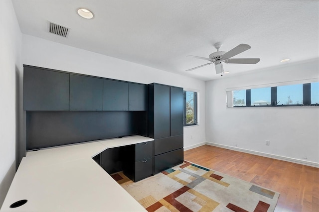 2918 Avenue Ave E, Holmes Beach, FL 34217 - unfurnished office featuring light wood-style floors, a ceiling fan, built in study area, and recessed lighting
