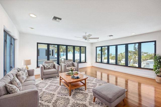 2918 Avenue Ave E, Holmes Beach, FL 34217 - living area with light wood-style flooring, recessed lighting, and ceiling fan