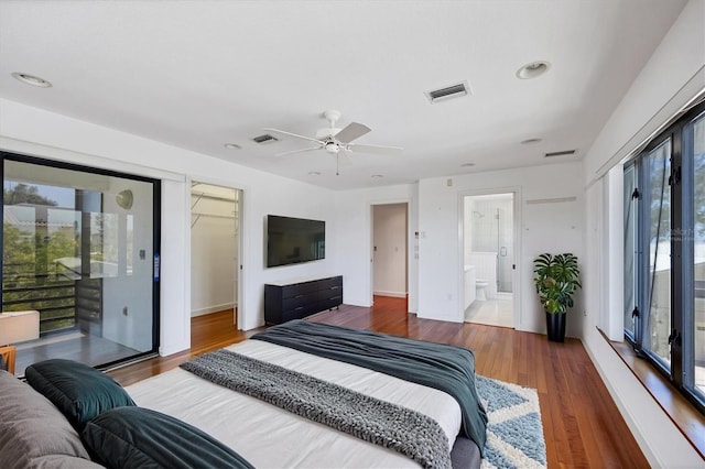 2918 Avenue Ave E, Holmes Beach, FL 34217 - bedroom with wood finished floors, access to exterior, ceiling fan, recessed lighting, and ensuite bathroom