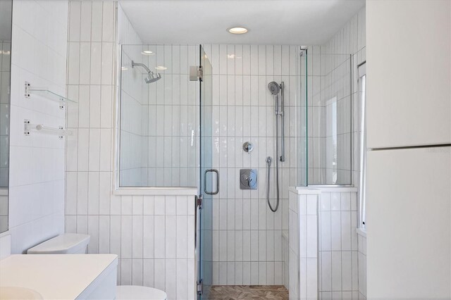 2918 Avenue Ave E, Holmes Beach, FL 34217 - full bathroom with tile walls, a stall shower, and vanity
