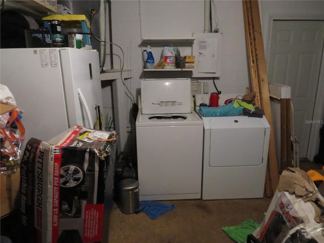 9835 El Camino Real Ave, Port Richey, FL 34668 - washroom with washing machine and clothes dryer