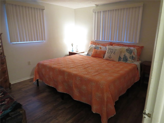 9835 El Camino Real Ave, Port Richey, FL 34668 - bedroom with wood finished floors and baseboards