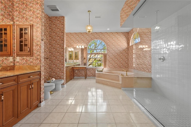 4180 Via Mirada, Sarasota, FL 34238 - full bath featuring wallpapered walls, a bidet, vanity, tile patterned floors, and a garden tub