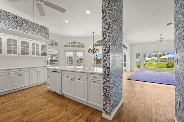 4180 Via Mirada, Sarasota, FL 34238 - kitchen with ceiling fan, white dishwasher, a sink, light wood finished floors, and recessed lighting