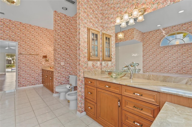 4180 Via Mirada, Sarasota, FL 34238 - full bath featuring a bidet, wallpapered walls, tile patterned flooring, toilet, and vanity