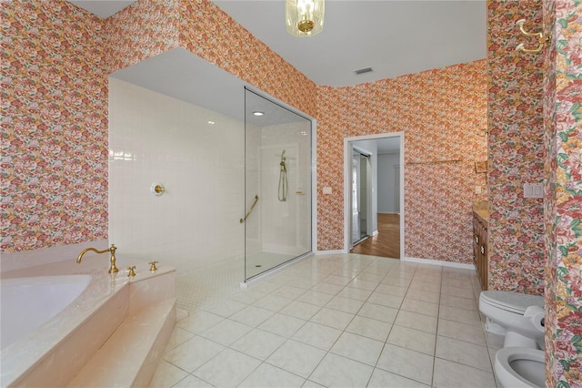 4180 Via Mirada, Sarasota, FL 34238 - full bathroom featuring toilet, walk in shower, tile patterned floors, a bath, and wallpapered walls
