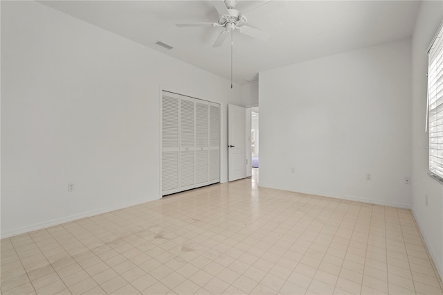 4180 Via Mirada, Sarasota, FL 34238 - spare room with a ceiling fan and baseboards
