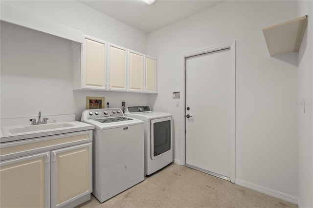 4180 Via Mirada, Sarasota, FL 34238 - laundry area featuring independent washer and dryer, light flooring, cabinet space, and baseboards