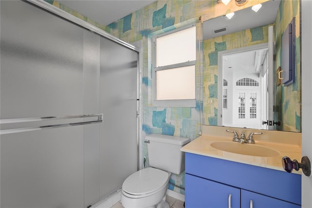 4180 Via Mirada, Sarasota, FL 34238 - bathroom featuring wallpapered walls, a stall shower, vanity, and toilet