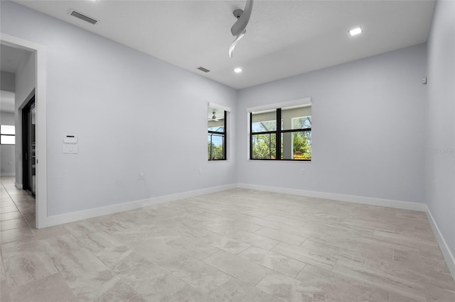 8229 Grande Shores Dr, Sarasota, FL 34240 - unfurnished room featuring recessed lighting and baseboards