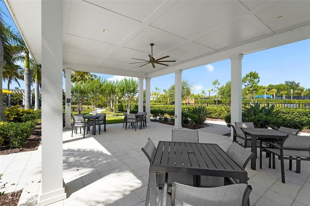 8229 Grande Shores Dr, Sarasota, FL 34240 - view of patio / terrace with outdoor dining space and a ceiling fan