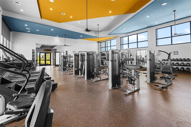 8229 Grande Shores Dr, Sarasota, FL 34240 - exercise room with a towering ceiling, a ceiling fan, and recessed lighting