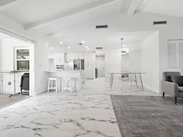 living area featuring visible vents, vaulted ceiling with beams, and marble finish floor