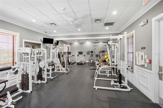 2353 Rosewood Ln, North Port, FL 34289 - exercise room featuring crown molding and baseboards