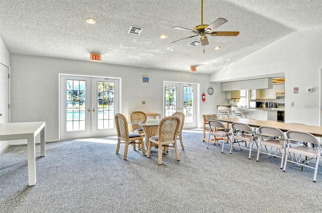 7876 Eagle Creek Dr, Sarasota, FL 34243 - carpeted dining area with french doors, a textured ceiling, ceiling fan, and recessed lighting