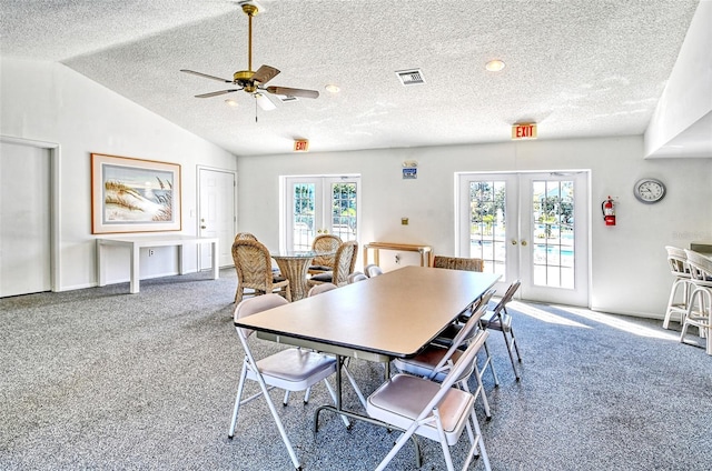 7876 Eagle Creek Dr, Sarasota, FL 34243 - carpeted dining room featuring french doors, a textured ceiling, ceiling fan, and vaulted ceiling