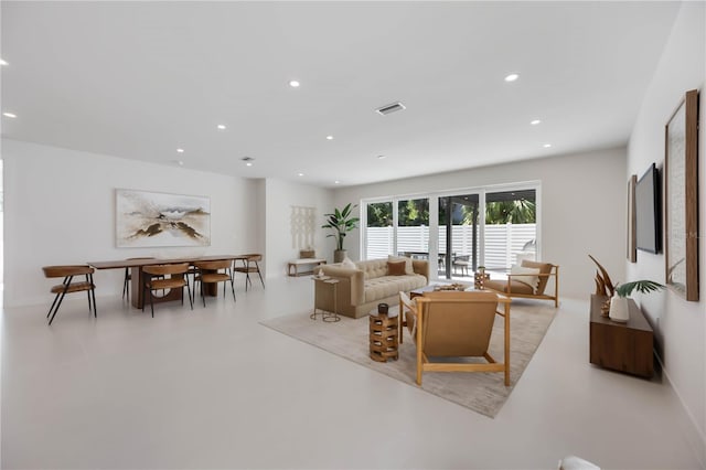 2596 Floyd St, Sarasota, FL 34239 - living area featuring recessed lighting and concrete flooring