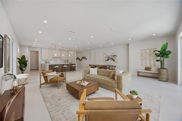 2596 Floyd St, Sarasota, FL 34239 - living area with recessed lighting and light tile patterned floors