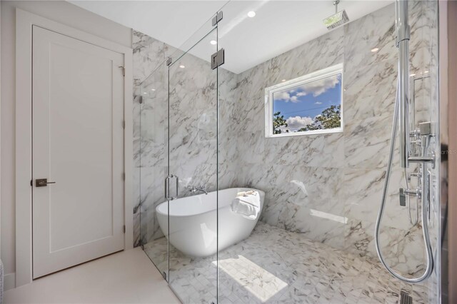 2596 Floyd St, Sarasota, FL 34239 - bathroom with a marble finish shower and a freestanding tub