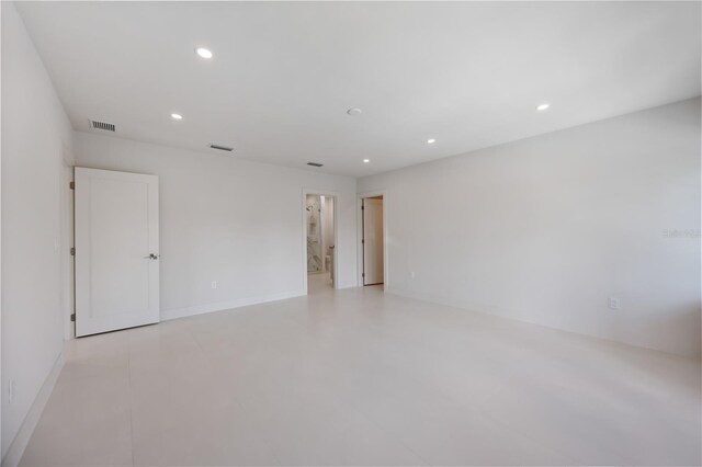 2596 Floyd St, Sarasota, FL 34239 - spare room featuring recessed lighting, baseboards, and concrete floors