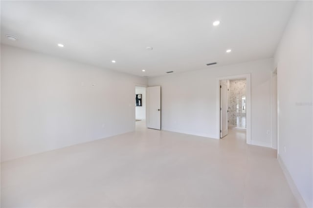 2596 Floyd St, Sarasota, FL 34239 - empty room featuring recessed lighting, baseboards, and concrete floors