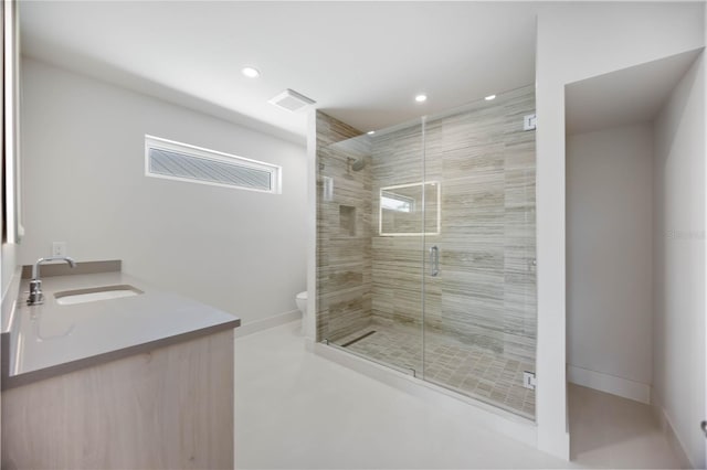 2596 Floyd St, Sarasota, FL 34239 - bathroom with toilet, a shower stall, recessed lighting, double vanity, and baseboards