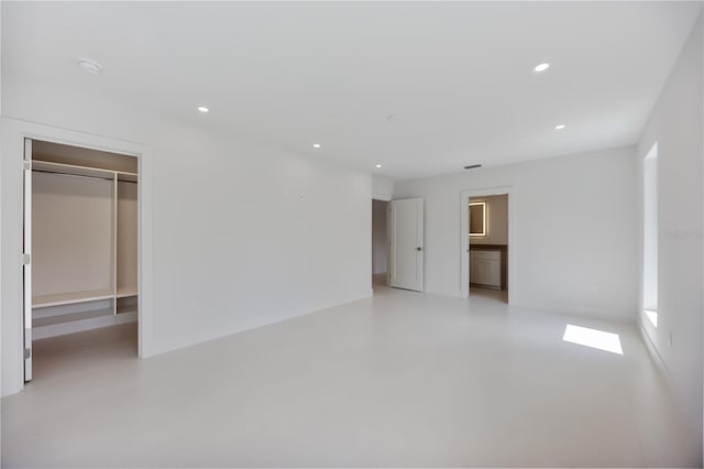 2596 Floyd St, Sarasota, FL 34239 - spare room featuring concrete floors and recessed lighting