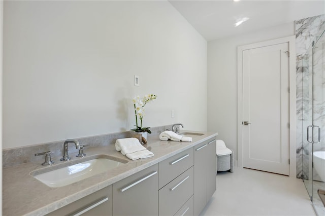2596 Floyd St, Sarasota, FL 34239 - bathroom with a shower stall and double vanity