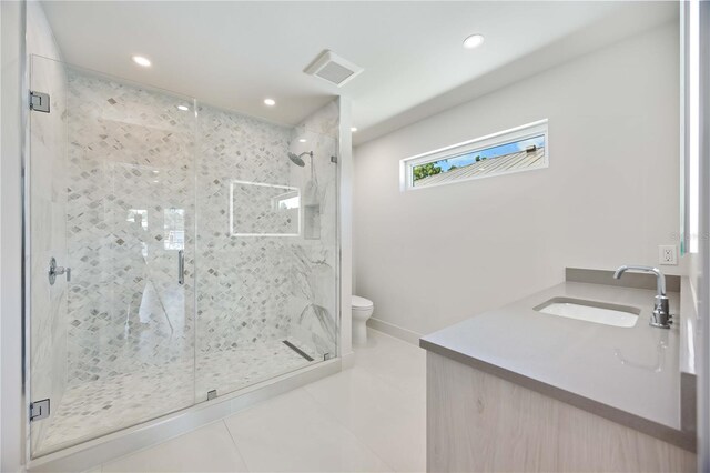 2596 Floyd St, Sarasota, FL 34239 - full bathroom with a sink, tile patterned flooring, toilet, a marble finish shower, and recessed lighting