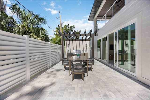 2596 Floyd St, Sarasota, FL 34239 - view of patio / terrace featuring outdoor dining area, a fenced backyard, a pergola, and a grill