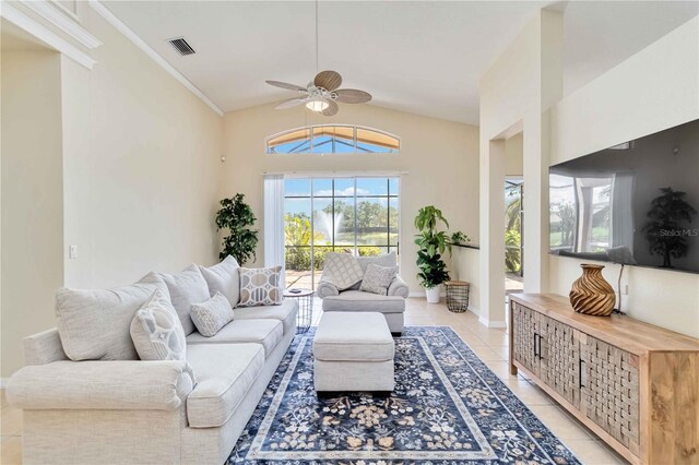 6519 43rd Ct E, Sarasota, FL 34243 - living area featuring lofted ceiling, light tile patterned flooring, ceiling fan, and visible vents