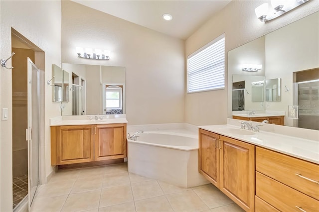 6519 43rd Ct E, Sarasota, FL 34243 - full bath featuring a sink, tile patterned flooring, a stall shower, and a bath