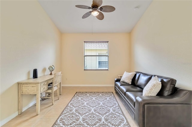6519 43rd Ct E, Sarasota, FL 34243 - living area with light tile patterned floors, baseboards, and ceiling fan