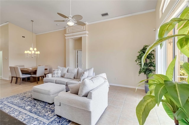 6519 43rd Ct E, Sarasota, FL 34243 - living room with ceiling fan with notable chandelier, visible vents, baseboards, light tile patterned flooring, and ornamental molding